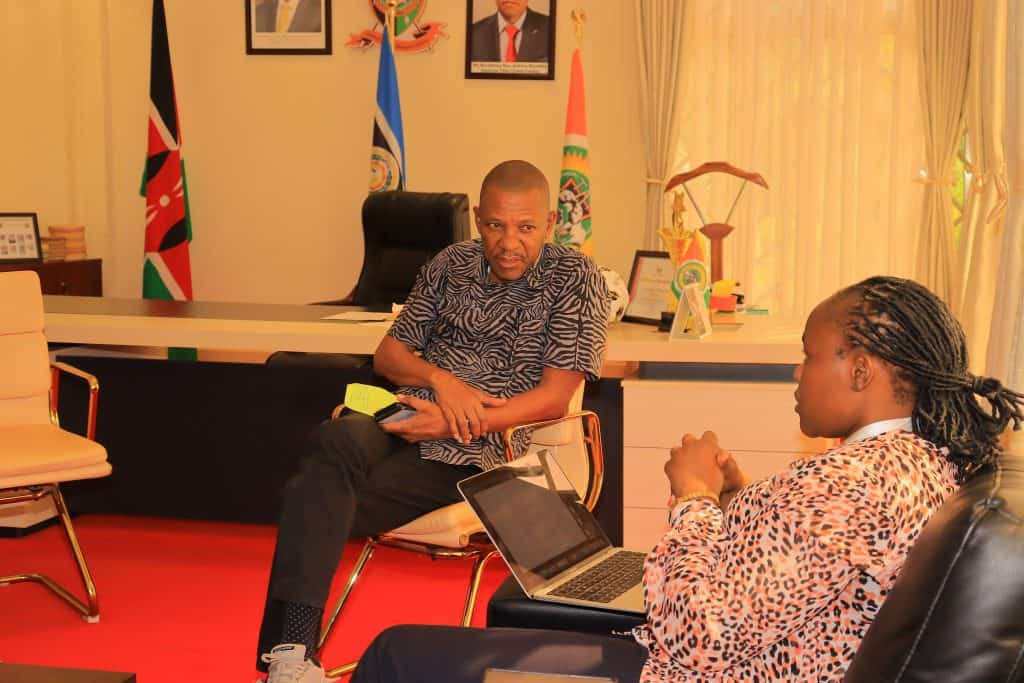 H.E. Dr. Andrew Mwadime, Governor of Taita Taveta County (left), engages with ACEECA CEO Pamela Gakii during a meeting held on April 30, 2025, at the Governor's Boardroom in Mwatate.
